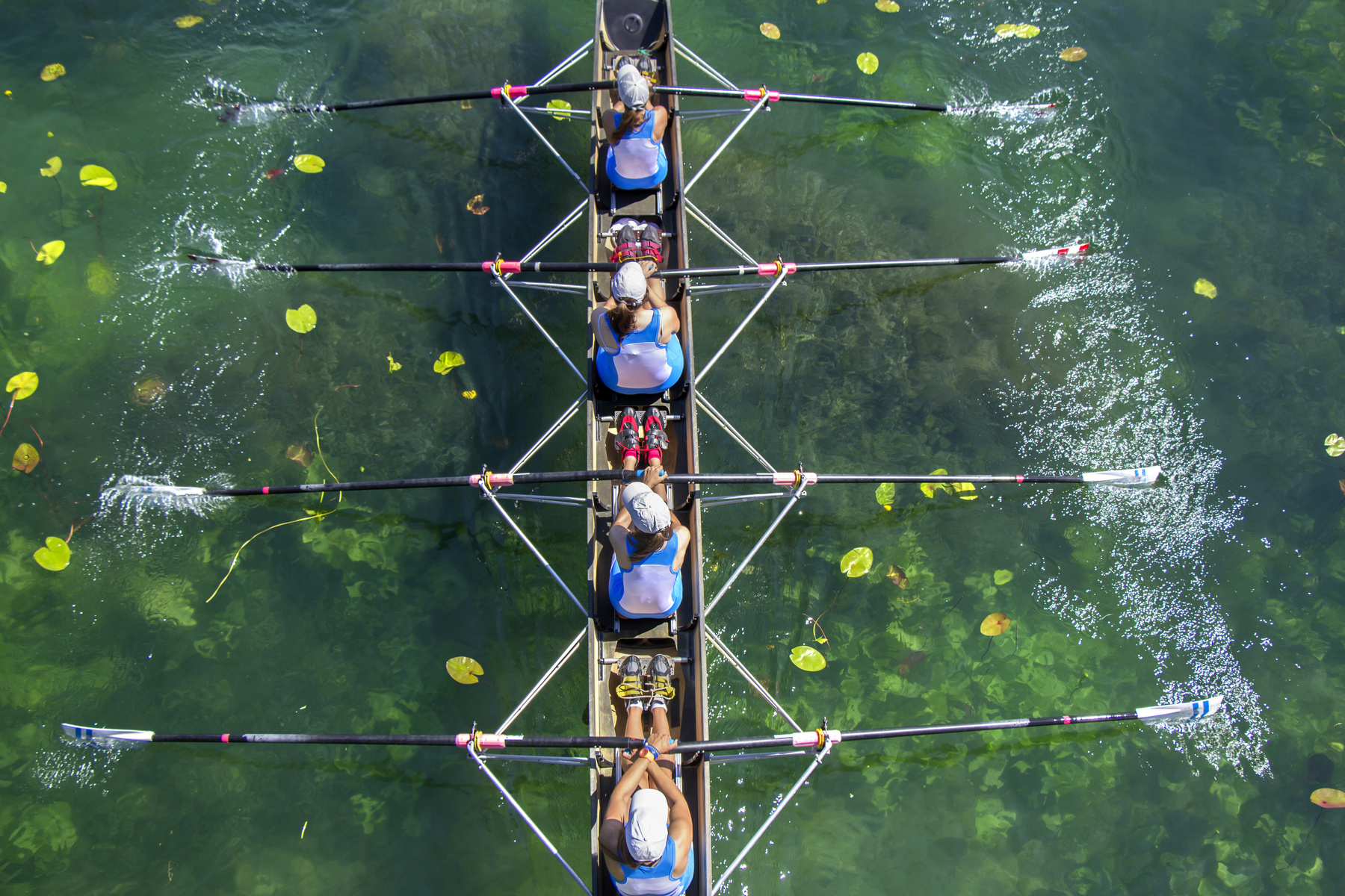  Rowing Team in Race on the Lake